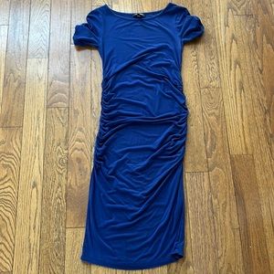 Blue Isabella Oliver dress made to fit pre-pregnancy, and through maternity.
